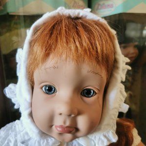 "Pouty" by Pat Secrist 1995, red hair and  blue eyes without eyelashes  After a